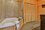 Soaking Tub & Shower In The Private Bathroom 